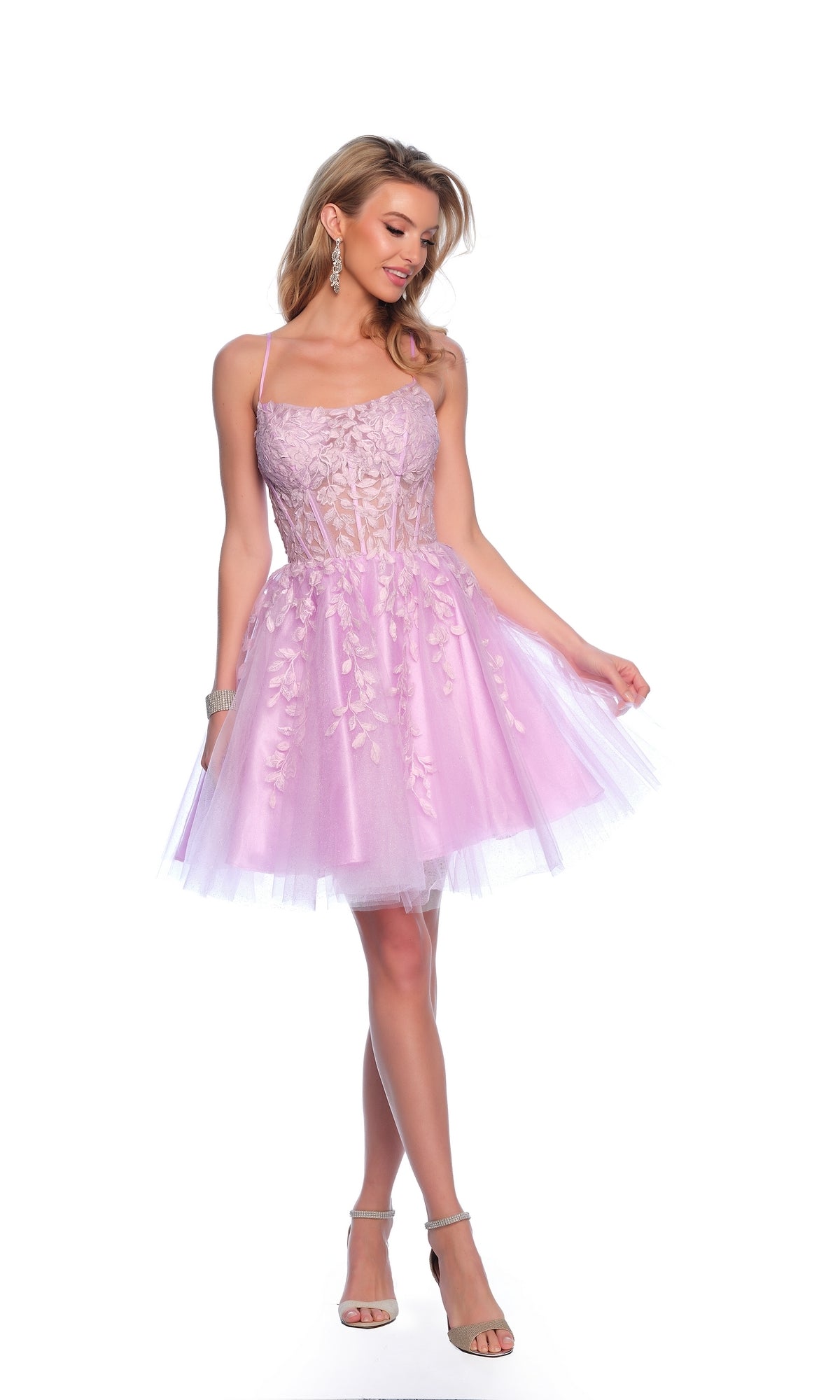 A woman poses against a white background in the Dave & Johnny 11750 Purple Homecoming Dress, featuring a sleeveless fit-and-flare design with a lace corset bodice and flared tulle skirt.